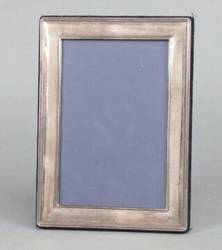 A silver photograph frame 17cm x 14cm 