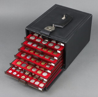 A collector's 8 drawer chest of world coins 