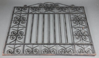 A pair of wrought iron garden gates 110cm x 246cm 