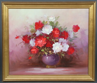 Robert Cox, oil on board, still life study of a vase of roses signed 49cm x 60cm, contained in a gilt frame 