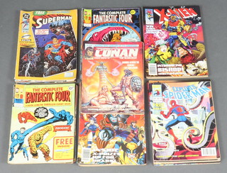 A large collection of DC and Marvel reissue comics