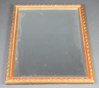 A rectangular bevelled plate mirror contained in a gilt and pink frame 86cm h x 59cm 