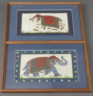 A pair of 20th Century Indian watercolours of elephants 22cm x 32cm 