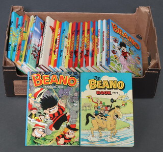 A collection of Beano annuals (contained in a blue plastic box)