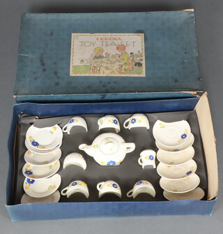 A child's Corona, floral patterned tea set, in original box (box a/f)