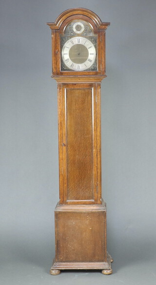 A 1930's oak longcase clock case with sliding hood 180cm h x 39cm w x 26cm d 