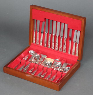 A canteen of Kings Pattern silver plated flatware contained in a teak canteen box 