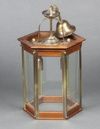 A hexagonal mahogany and gilt metal hanging lantern 36cm h x 28cm w x 32cm d 