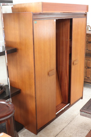 White and Newton of Portsmouth, a mid-Century triple teak wardrobe 180cm h x 93cm w x 56cm d 