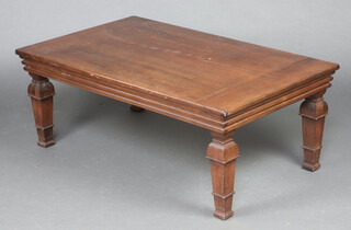 An American cherry wood style rectangular coffee table on square supports 49cm h x 127cm w x 46cm d (water and contact marks in places)