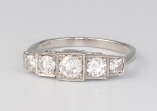 A platinum 5  stone stepped mount diamond ring, approx. 0.9ct, size M 1/2, 3.4 grams 