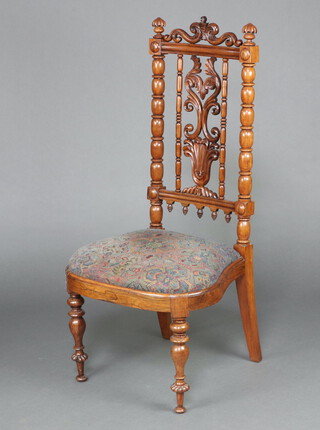 A Victorian rosewood slat back hall chair with bobbin turned decoration and upholstered drop in seat, raised on turned supports 114cm h x 53cm w x 47cm d (seat 29cm x 31cm) 