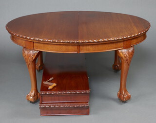 An Edwardian Chippendale style oval extending dining table raised on cabriole supports with 2 extra leaves and winder 72cm h x 120cm w x 148cm l when closed x 238cm l when fully extended 