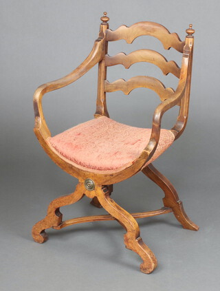 An Edwardian mahogany open arm carver chair with saddle seat, X framed supports and stretcher 83cm h x 55cm w x 40cm d (seat 23cm x 22cm) 