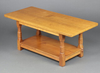 Beaverman: Colin Almack (1930-1996) (Sutton-under-Whitestonecliffe), a rectangular light oak 2 tier coffee table with adzed top, raised on turned and block supports, the base with carved beaver 44cm h x 106cm w x 48cm d 