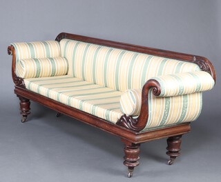 A William IV rosewood show frame sofa upholstered in Regency striped material, raised on turned supports 228cm h x 232cm w x 61cm d (seat 135cm x 39cm)