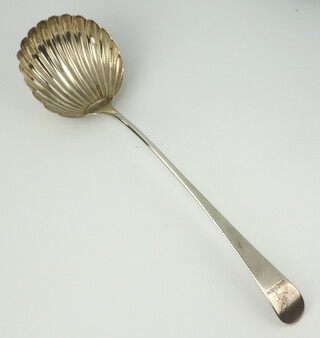 An 18th Century silver ladle with shell bowl and engraved armorial (possibly) Thomas Chawner, 165 grams 