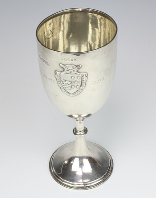 A silver trophy cup with repousse decoration Chester 1913, maker J Richard Attenborough Co Ltd 22.5cm, 235 grams 