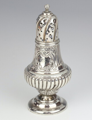 A Victorian repousse silver sugar shaker with engraved cartouche London 1893, 195 grams 