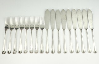 A set of silver fish eaters comprising 9 knives and 8 forks, Sheffield 1912, James Dixon & Son 642 grams 