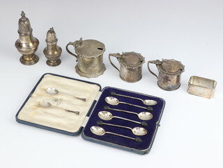 A silver pepperette Birmingham 1922, 4 other condiments, 8 spoons and a napkin ring, gross weight 481 grams 