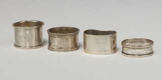 A silver engine turned napkin ring Birmingham 1916, 3 others, 112 grams 