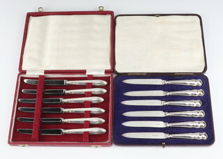 Six silver handled butter knives Sheffield 1925, 6 others Sheffield 1940, cased