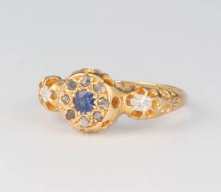 An 18ct yellow gold sapphire and diamond cluster ring 2.7 grams, size L 1/2