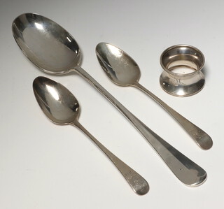 A Georgian style silver rat tail basting spoon with engraved monogram, London 2001 maker A Haviland-Nye  2 Georgian dessert spoons and a silver napkin ring  257 grams 