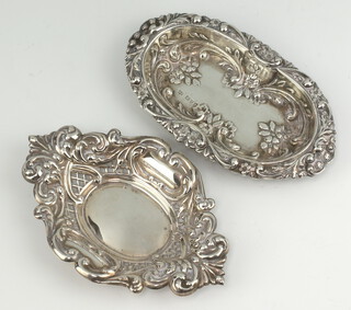 A Victorian silver repousse pin dish decorated with flowers Chester 1900 and 1 other, 85 grams 