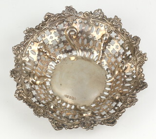 An Edwardian silver pierced repousse dish with floral decoration Sheffield 1903, 16cm, 143 grams 