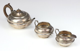 A 3 piece silver breakfast tea set with fruit wood mounts London 1922 maker Charles Boyton & Son Ltd gross weight 489 grams 