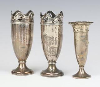 A pair of silver pierced vases Birmingham 1921 14cm, 1 other Birmingham 1925 