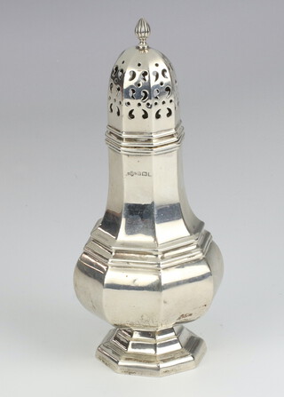 A Queen Anne style silver octagonal sugar shaker Birmingham 1929, 17cm, 142 grams 