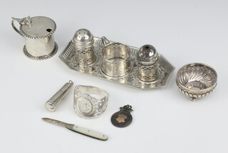 An Edwardian silver mustard London 1902, 3 condiments, 2 napkin rings, tray, cigarette holder case, fob and pen knife, weighable silver 195 grams