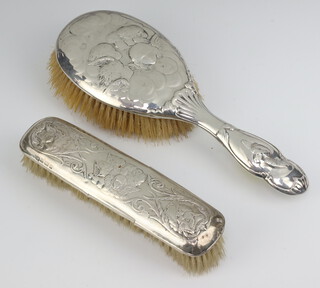 A silver backed Reynolds Angels hair brush and a ditto clothes brush, rubbed marks 