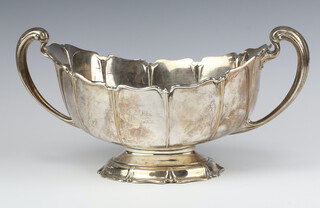 An Edwardian silver two handled bowl with engraved inscription Sheffield 1907, maker Atkin Brothers 869 grams, 37cm 