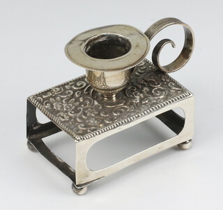 An Edwardian repousse silver matchbox and candle holder, Birmingham 1901, maker W J Rodgers 10cm, 72 grams 