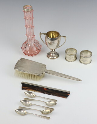 An Edwardian silver napkin ring Birmingham 1907, 1 other and 5 teaspoons, a cup, brush, comb and mounted vase, weighable silver 217 grams 