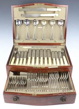 A serpentine mahogany canteen containing a quantity of Old English pattern silver plated cutlery for 6 (59 pieces) 