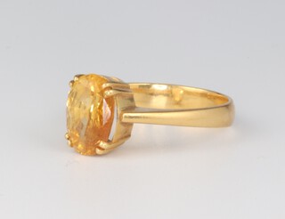 A yellow metal citrine ring, 4.1 grams, size M