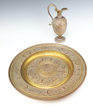 A Victorian Elkington style ex-plated brass and copper engraved platter dated 1871 with a matching ewer decorated with classical figures and instruments 44cm 