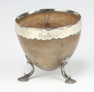 A Georgian white metal mounted coconut cup with engraved monogram on pad feet 8cm  