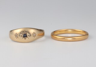 A 9ct yellow gold ring 2.1 grams, size N and a 22ct gold wedding band size O 1/2, 3.8 grams 