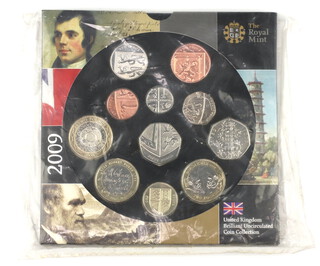 A 2009 United Kingdom brilliant uncirculated coin collection including the Kew Gardens 50 pence piece, in original unbroken outer packaging  