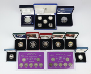 Seven silver proof one pound coins, 7 other proof silver coins, all cased, total weight 170 grams and 2 cased sets of World War Two shillings (14) sealed 