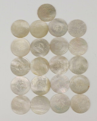 Twenty one 19th Century Chinese engraved mother of pearl counters