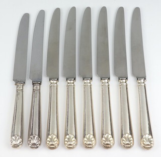 Eight shell pattern silver handled dinner knives Sheffield 1996 