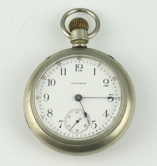 A metal cased mechanical pocket watch  with seconds at 6 o'clock  and red 5 minute markers, the case numbered 485333, the movement engraved American Waltham Watch Co. numbered 18559962 contained in a 60mm case with a gilt panel of a locomotive 