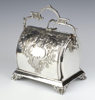 An Edwardian silver plated repousse patented action biscuit box with swing handle, raised on scroll feet 19cm 